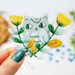 Clear Grey Cat and Yellow Flowers Sticker 3x2.25 inch